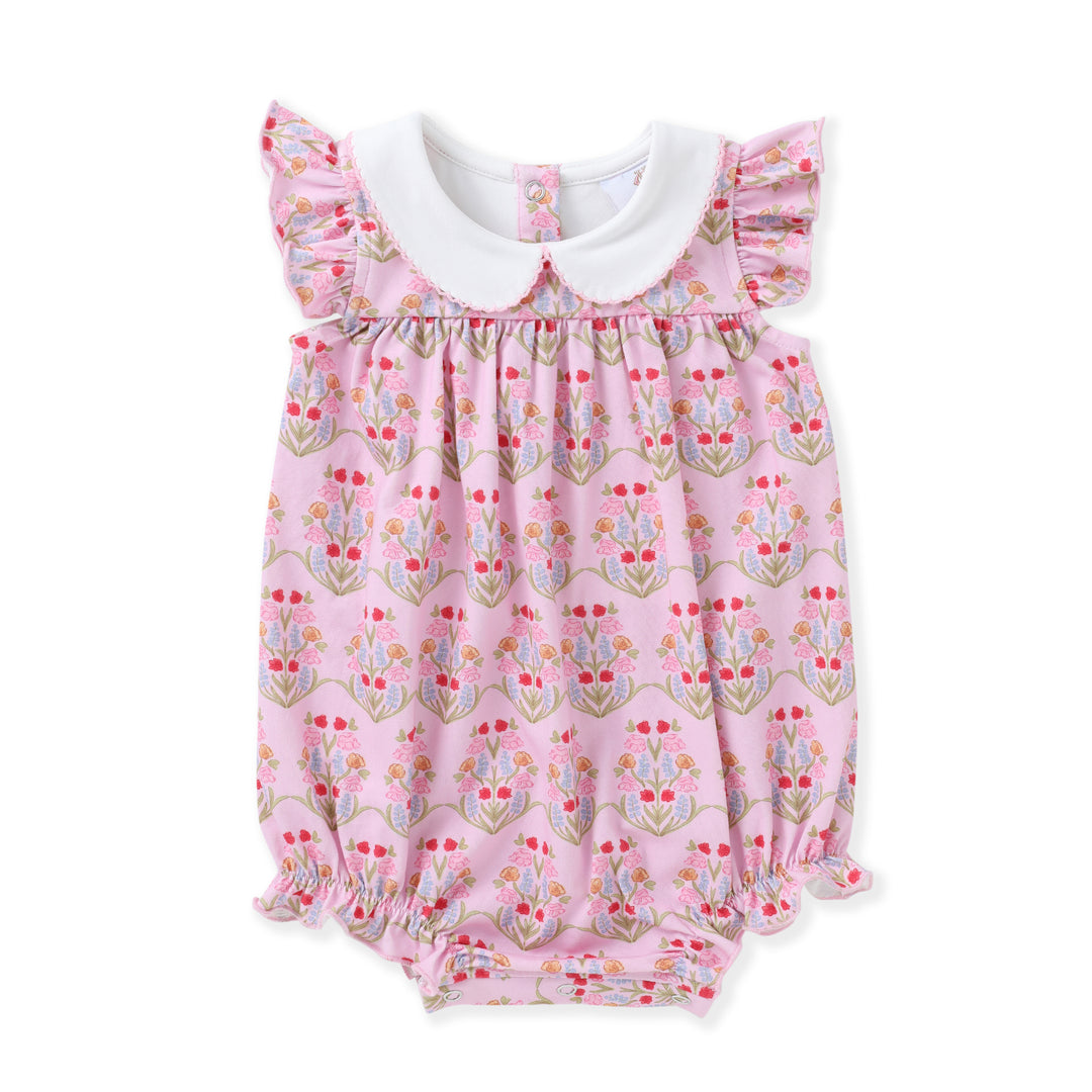 Pink floral baby romper with white collar on a white background