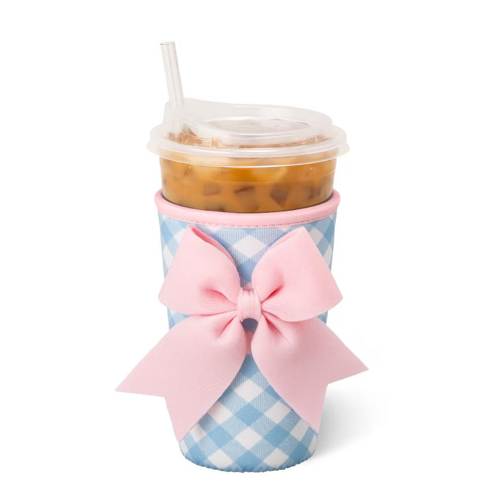 Blue gingham tumbler sleeve with pink bow accent designed for iced coffee cups and tumblers, cute Southern-inspired drink accessory | Walker Boutique