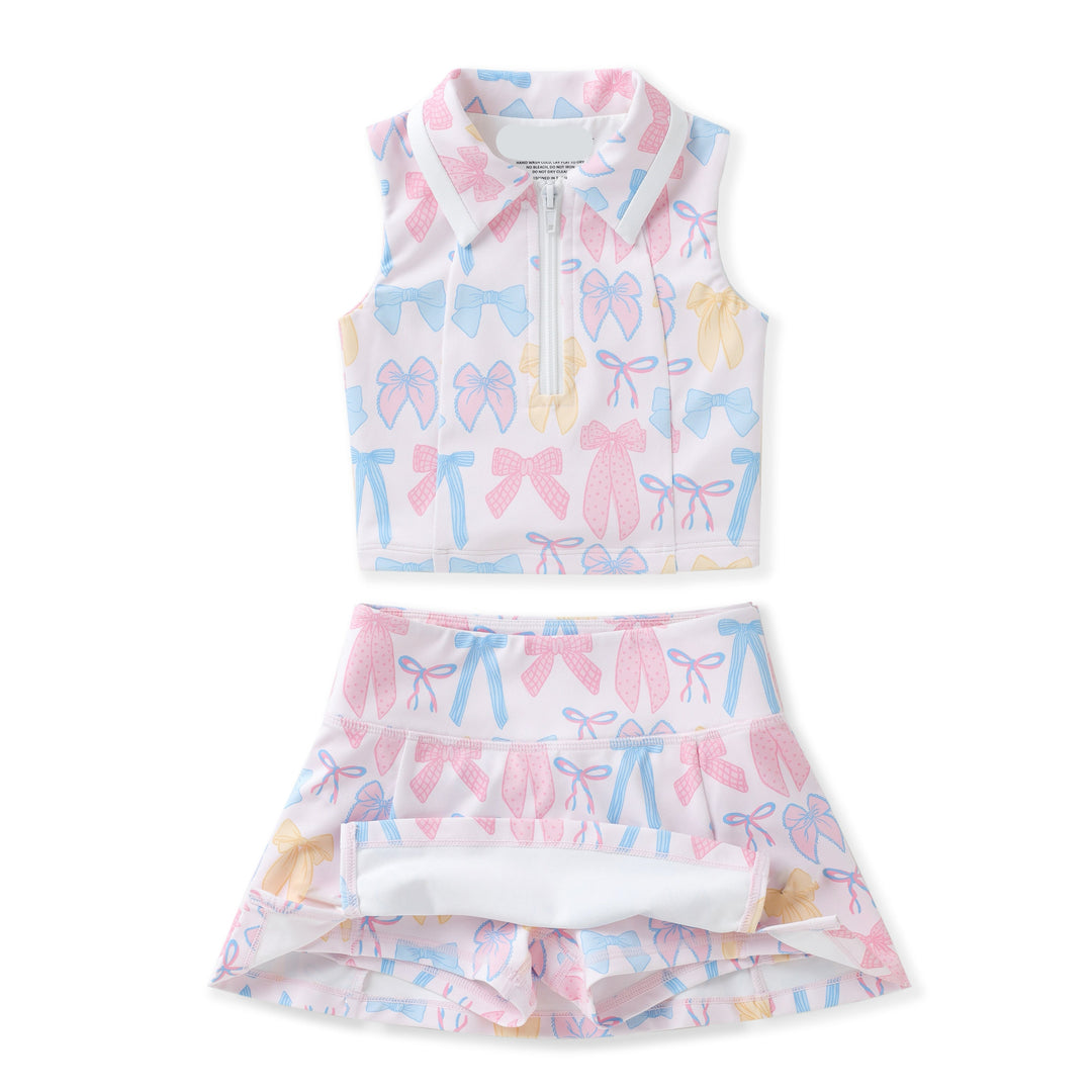 Allover spring bow print with preppy charm
Two-piece collared tank and; skort set