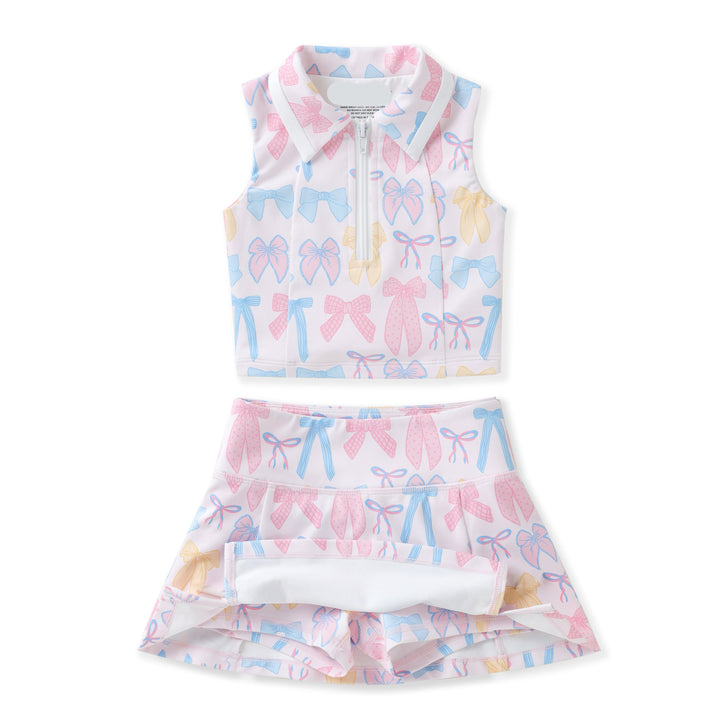 Allover spring bow print with preppy charm
Two-piece collared tank and; skort set