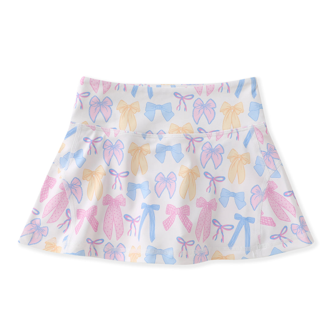 Skirt with pastel bow pattern on a white background