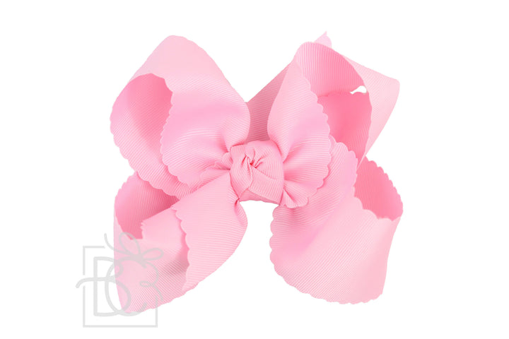 PINK SCALLOPED EDGE BOW