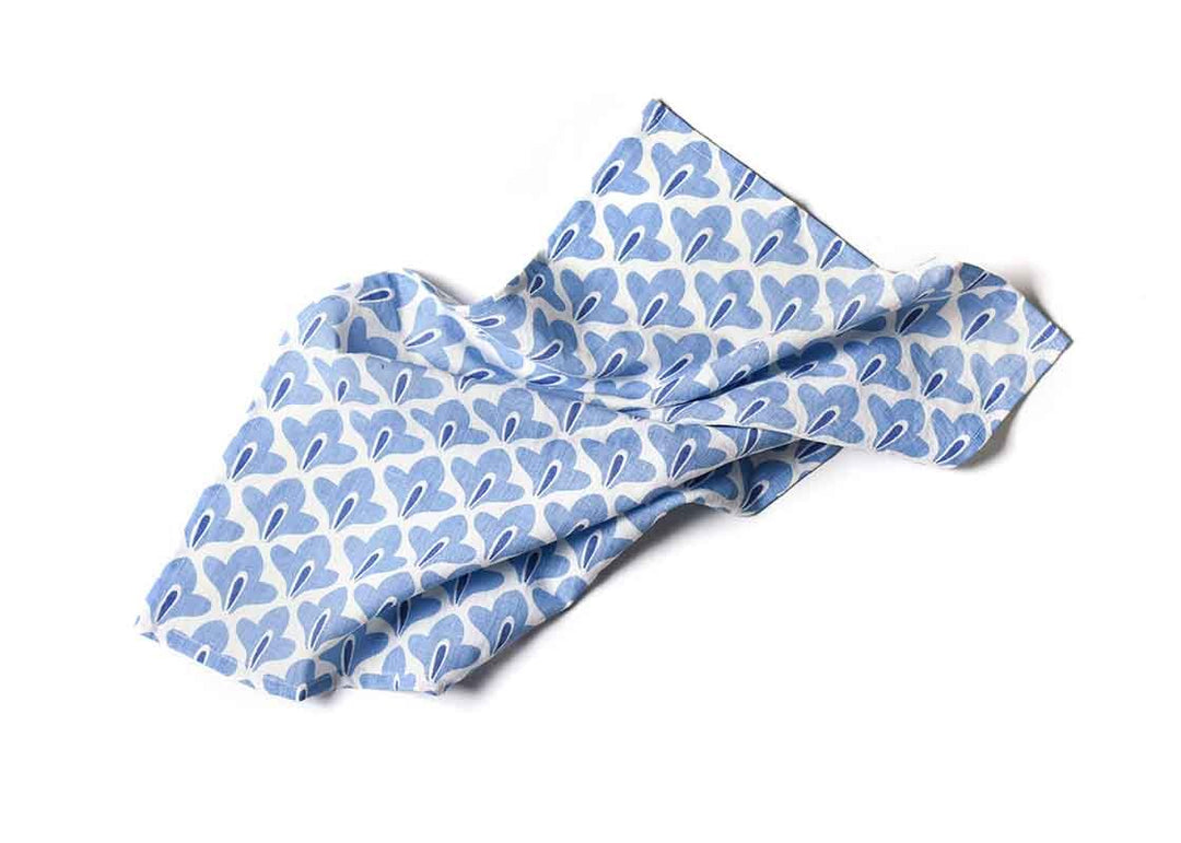 Blue patterned headband on a white background