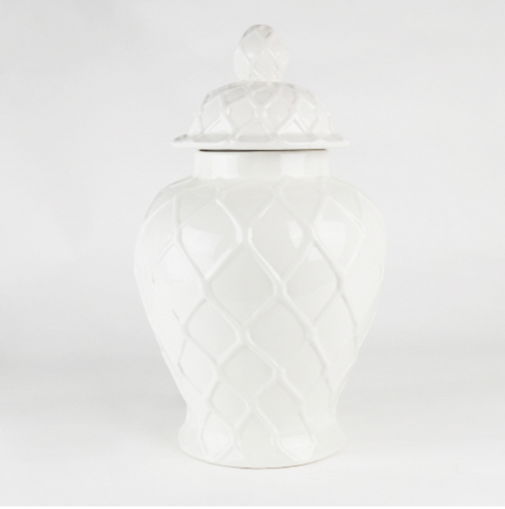A white textured ginger jar with a lid, dolomite-based decorative home accessory