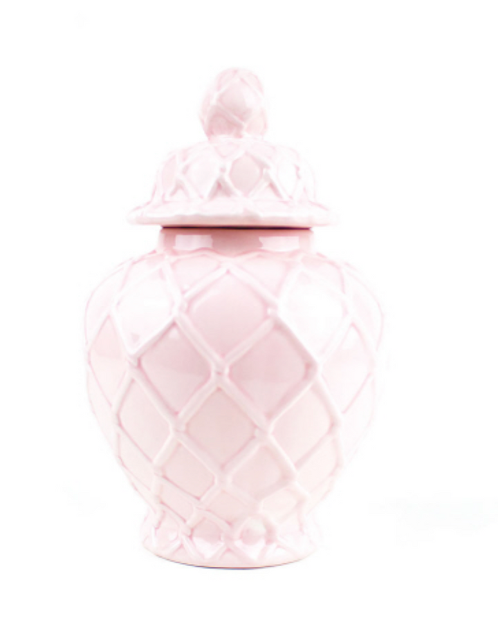 A textured pink ginger jar with a lid, against a white background.
