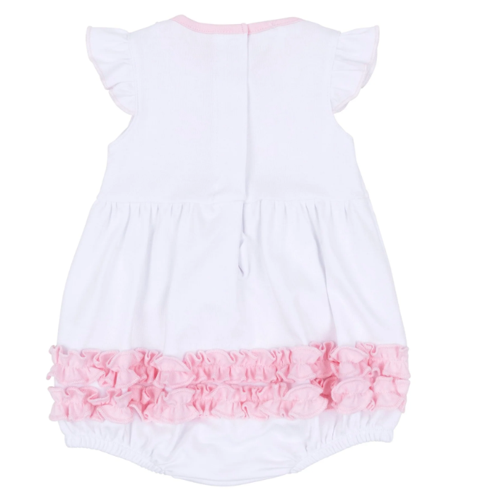 White baby romper with pink ruffled bottom on a white background
