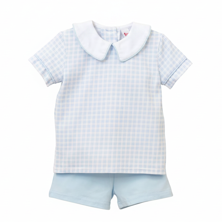 Children's outfit with checkered shirt and shorts on a white background