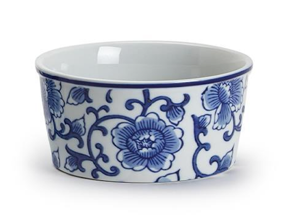 Ceramic bowl with blue floral patterns on a white background