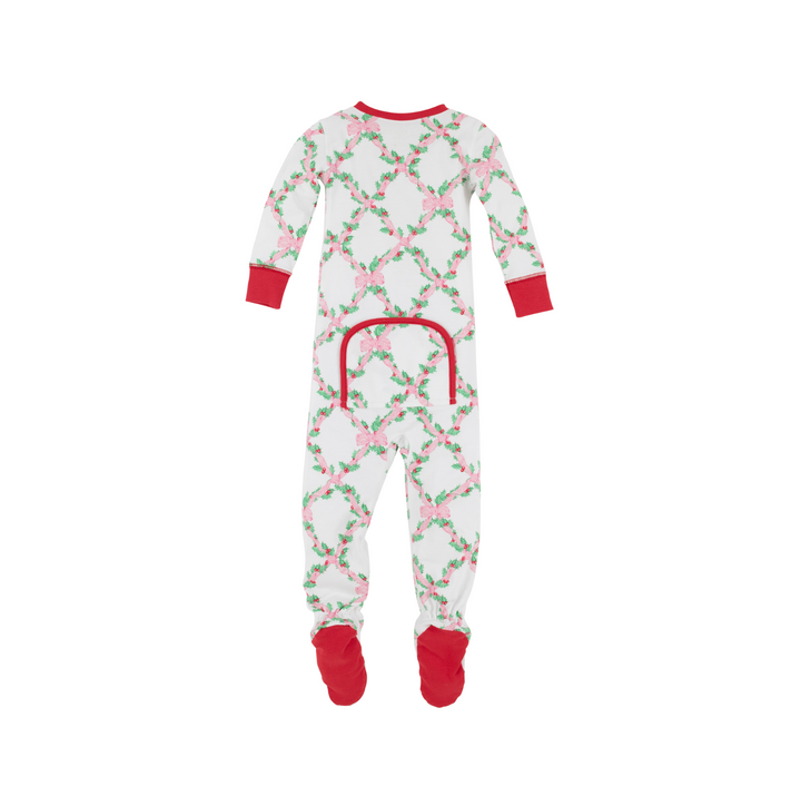 Children's onesie with floral pattern and red accents on a white background