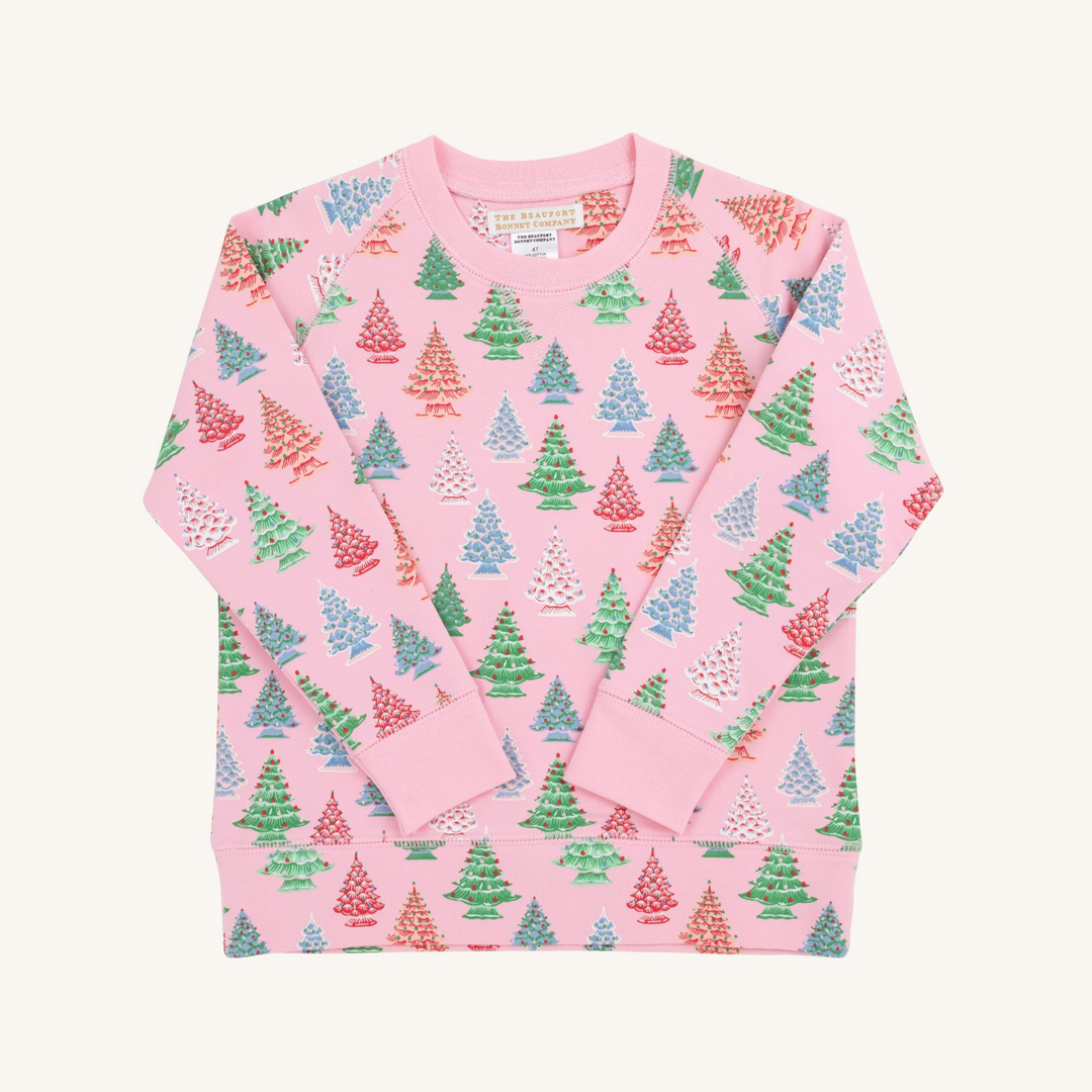 christmas tree pattern on pink sweatshirt on white background