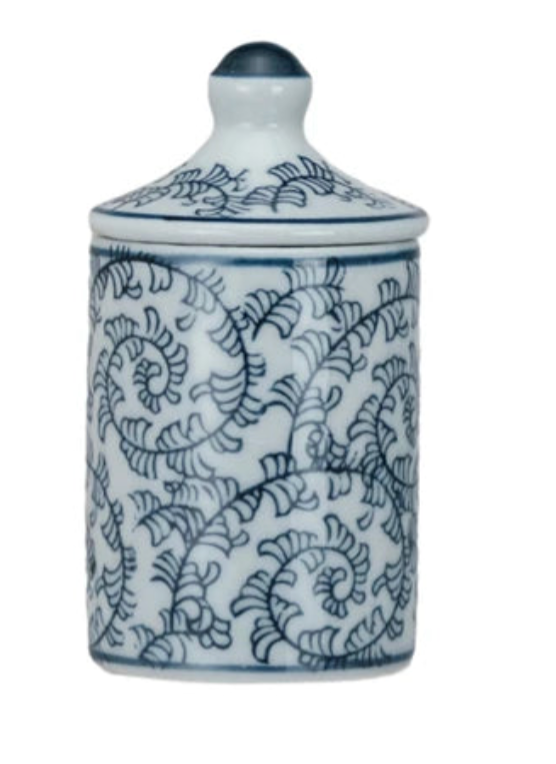 Ceramic jar with blue and white pattern on a white background