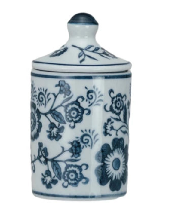 Ceramic jar with blue floral patterns on a white background