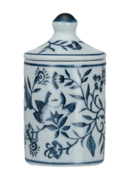 Ceramic jar with blue floral patterns on a white background
