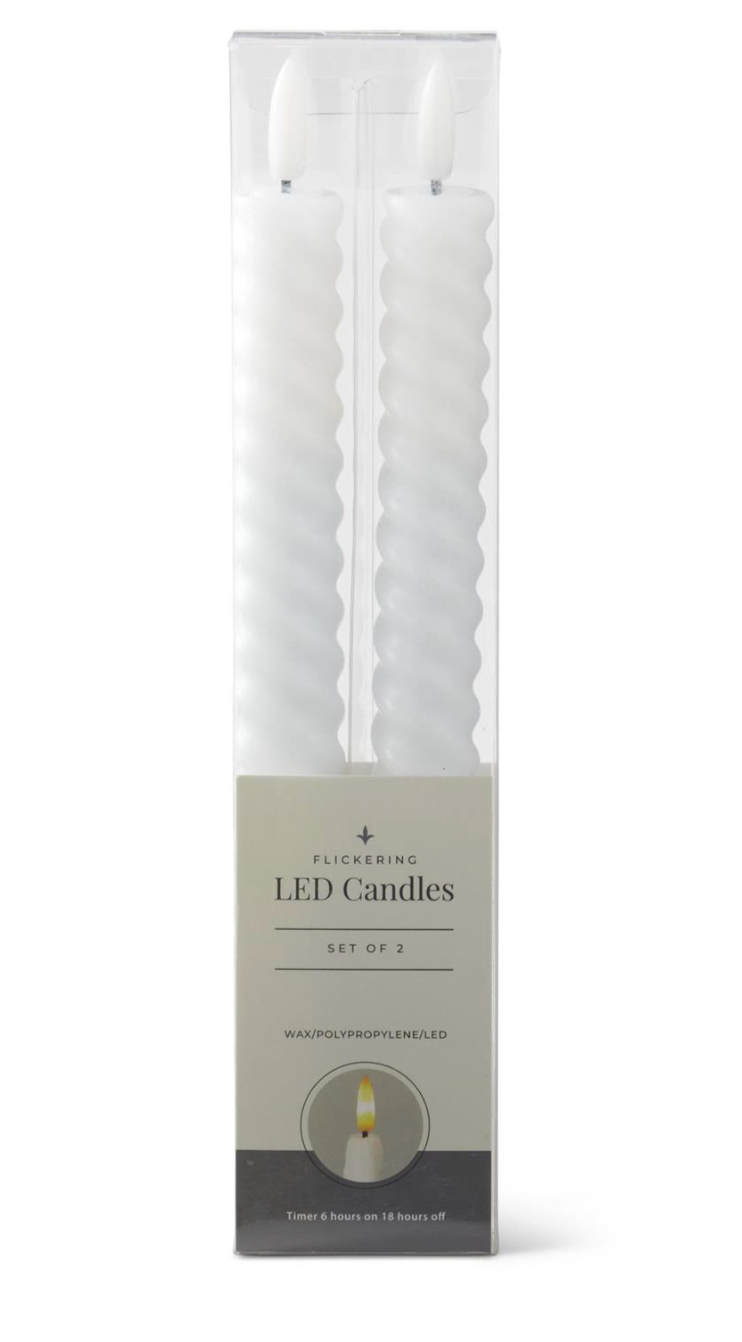Set of LED candles in packaging on a white background