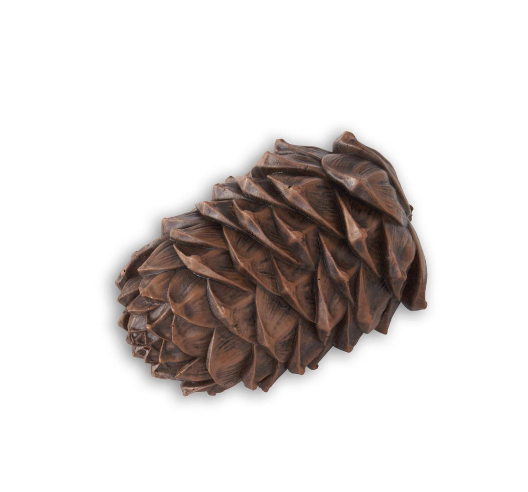Bronze pine cone on a white background