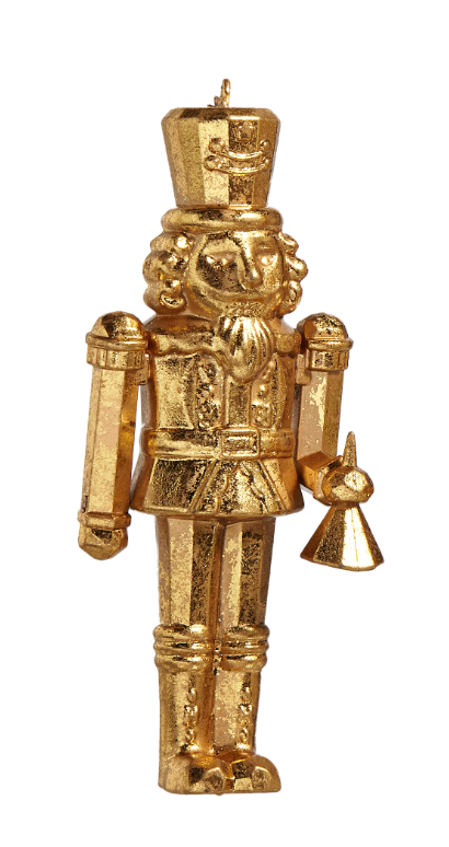 Gold nutcracker figurine on a white background
