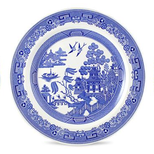 Decorative plate with blue and white Chinese-style pattern on a white background