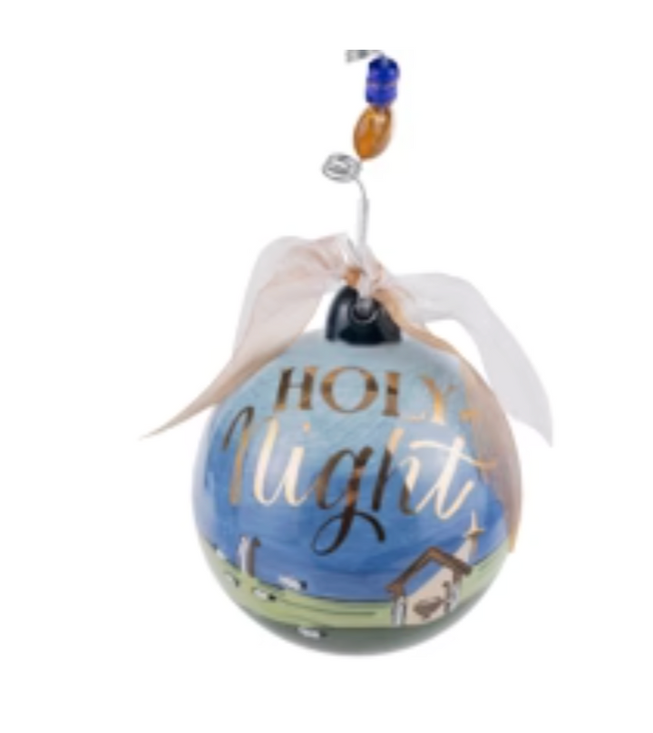 Decorative ornament with 'Holy Night' text on a blue background