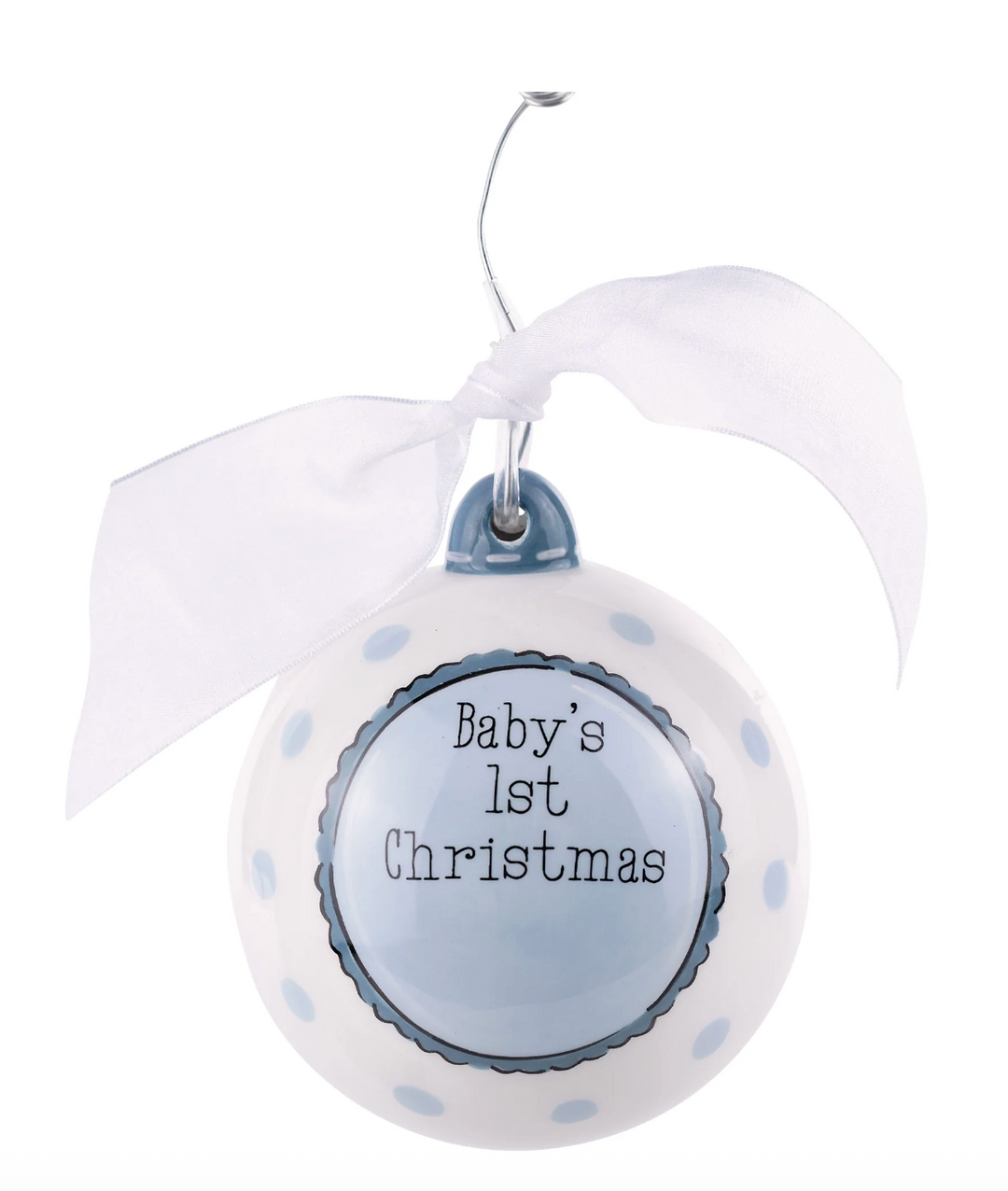 Round white ornament with blue polka dots and 'Baby's 1st Christmas' text on a white background