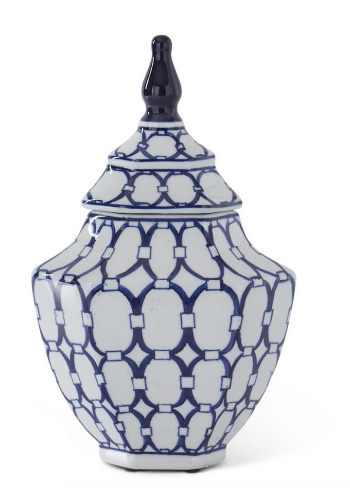 Blue and white patterned vase with a lid on a white background