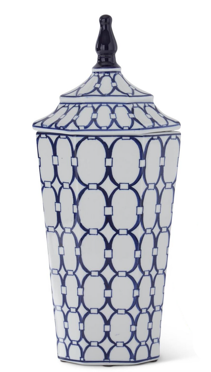 Ceramic vase with blue geometric pattern on a white background