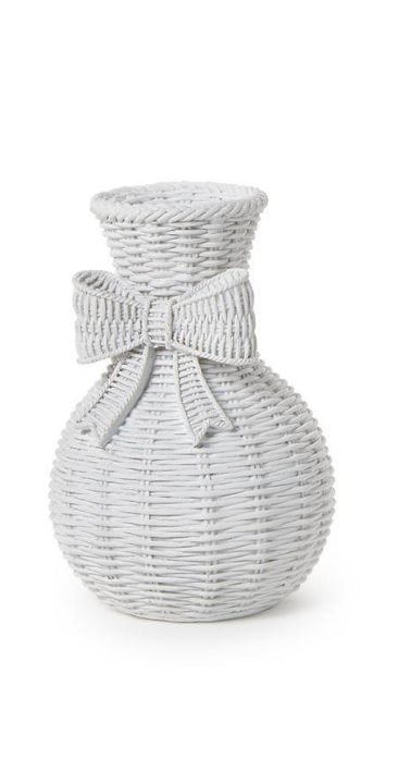 Woven vase with a bow on a white background