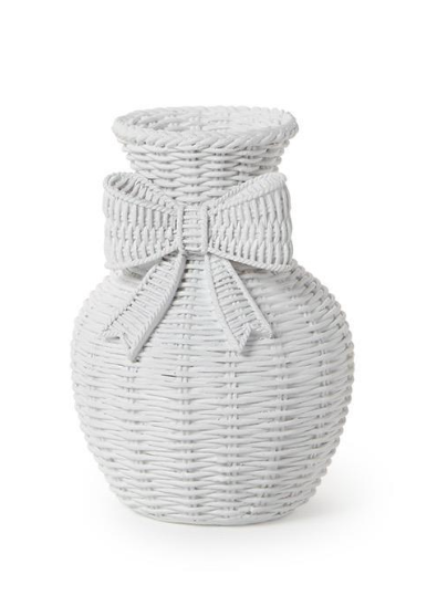 Woven textured vase with a bow on a white background