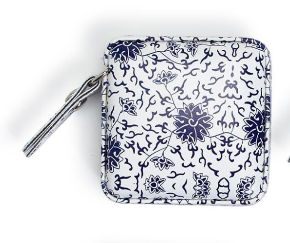 Small pouch with blue floral pattern on a white background