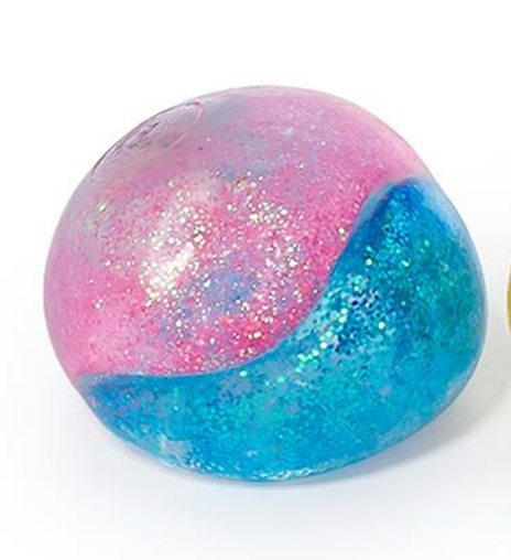 Colorful glittery ball with pink and blue gradient on a white background