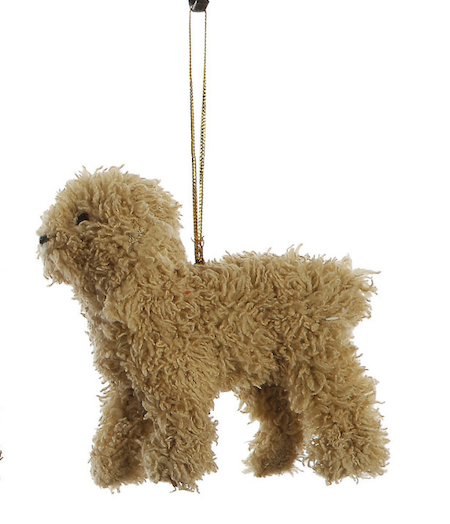 A fluffy beige dog-shaped hanging ornament with a gold hanging string, shown against a plain white background.