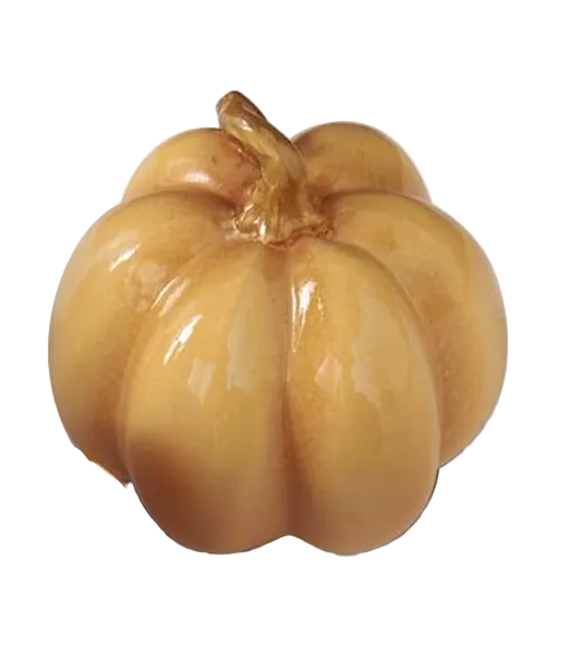 A glossy ceramic decorative pumpkin in a warm golden-orange color, shown on a clean white background 