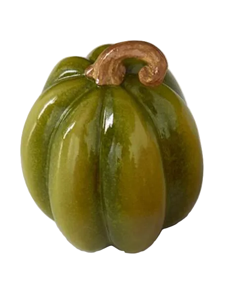 A glossy green ceramic pumpkin figurine with a brown stem, shown on a white background 