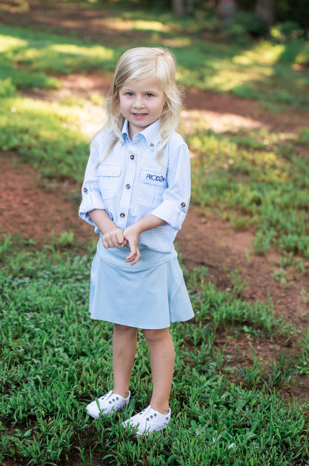 LITTLE GIRL WEARING GINGHAM BLUE LONG SLEEVE BUTTON DOWN