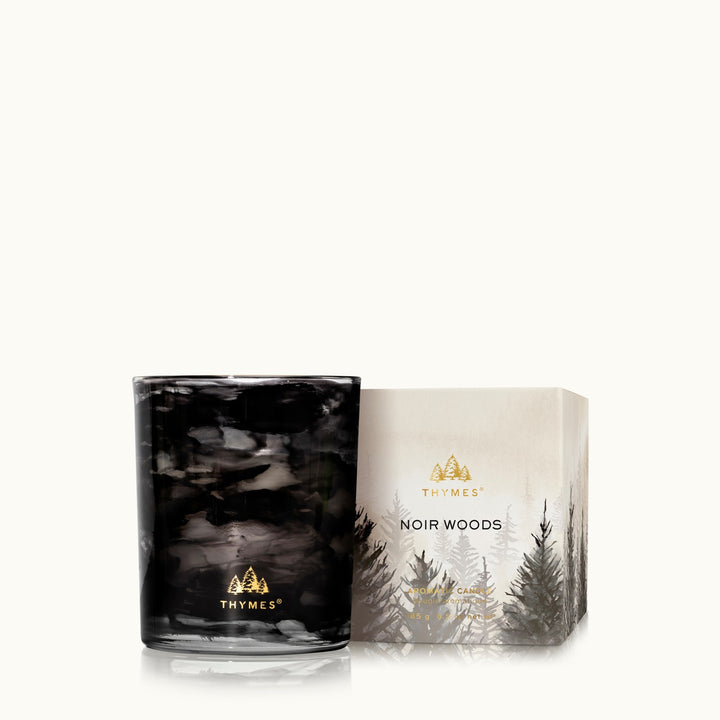 Thymes Noir Woods 6.5 ounce candle and black gift box with gold accents