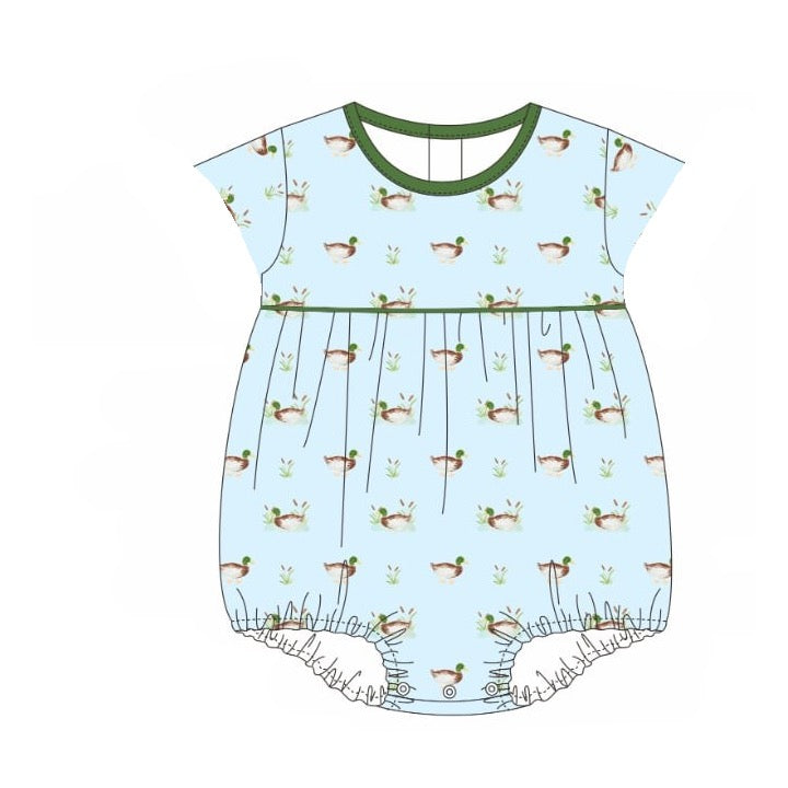 Children's romper with duck pattern on a light blue background
