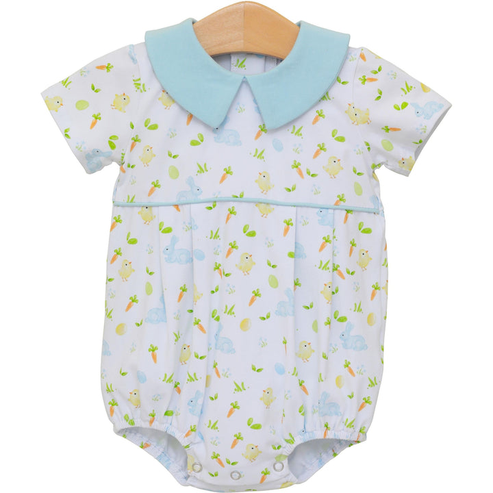 Baby romper with chick pattern on a white background