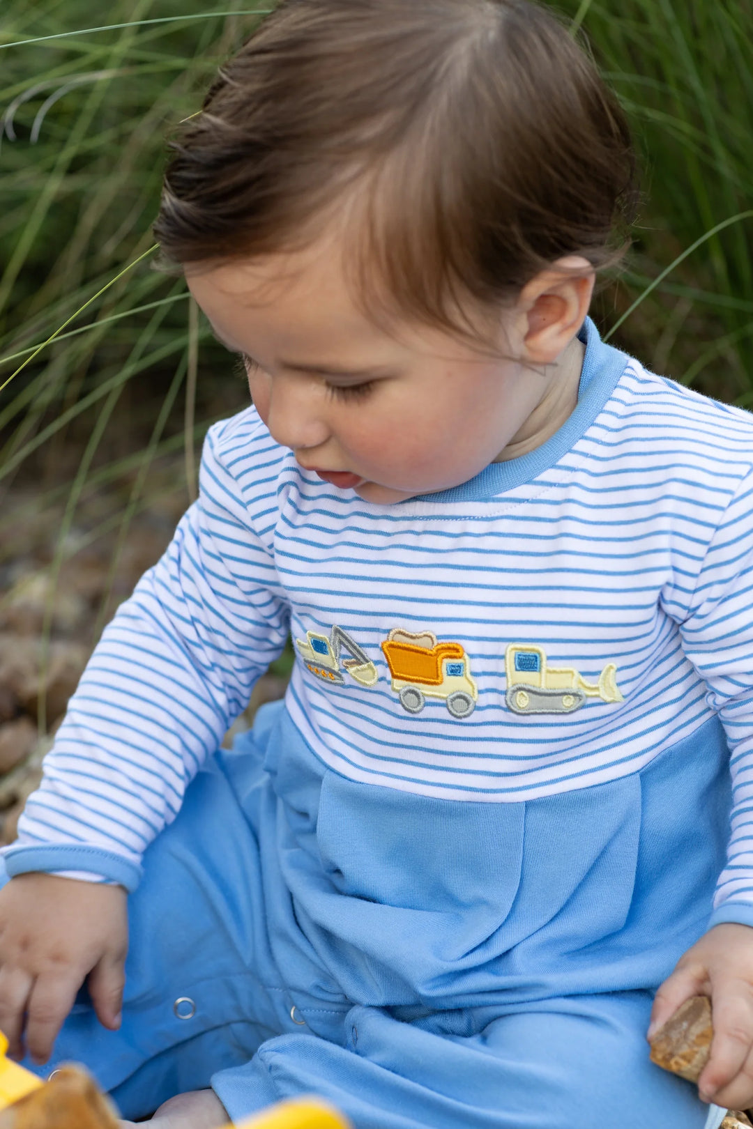 BLUE EMBROIDERED CONSTRUCTION TRUCKS ROMPER