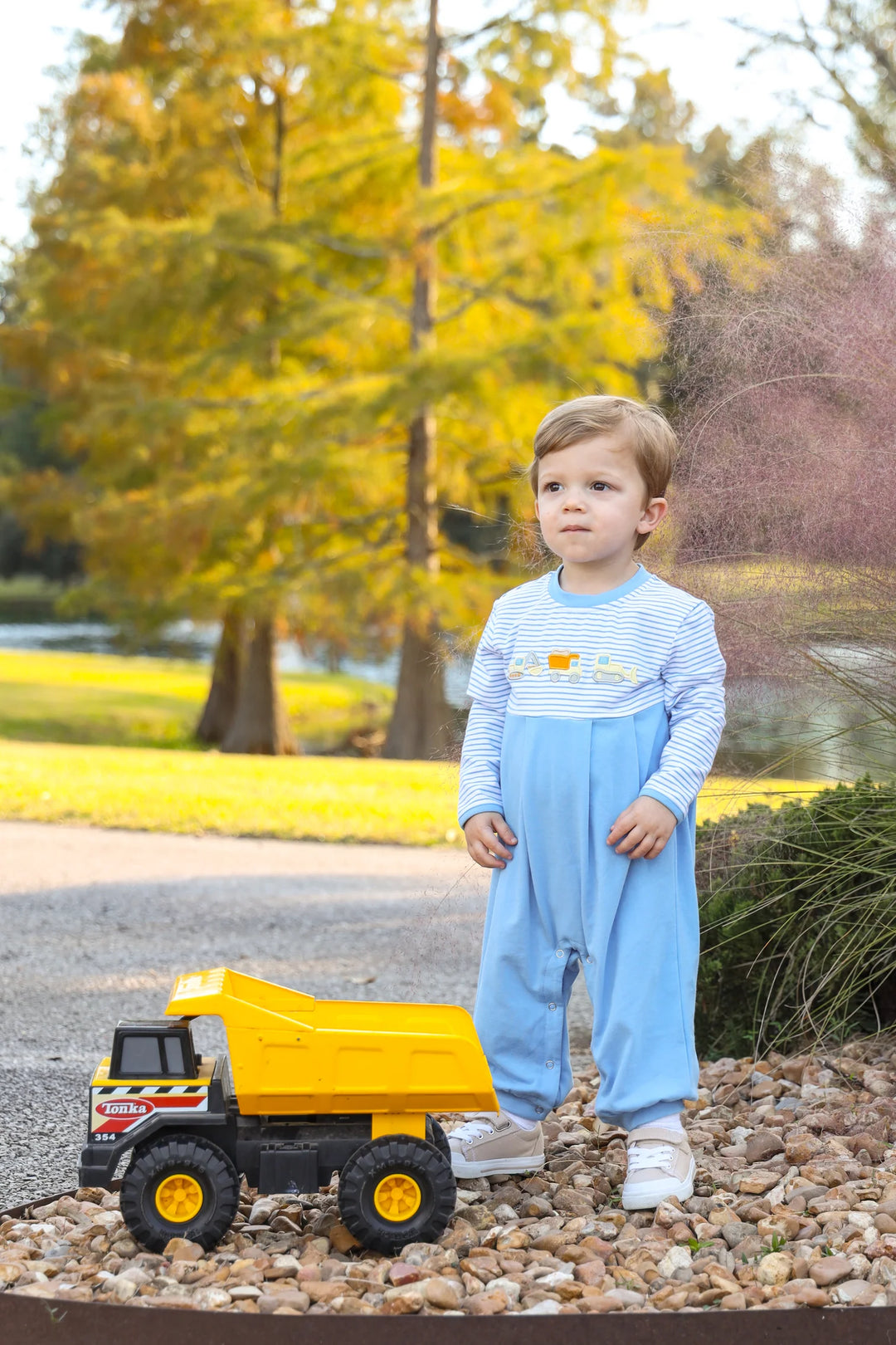 BLUE EMBROIDERED CONSTRUCTION TRUCKS ROMPER