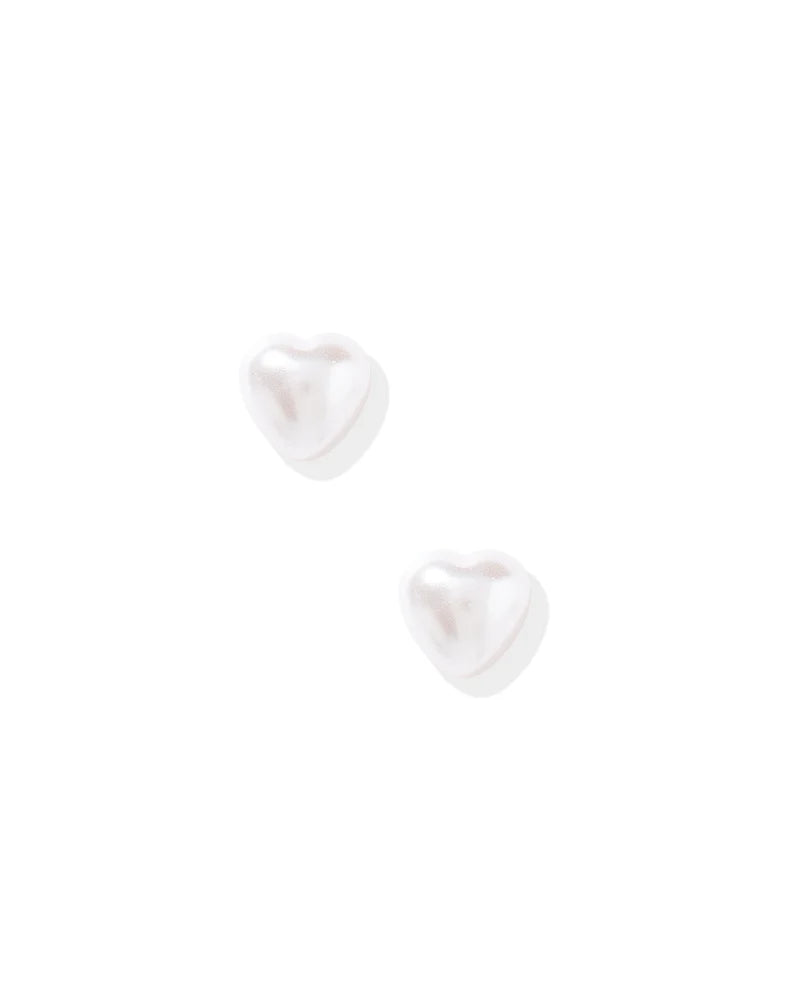 Lucia small pearl heart screwback stud earring worn on the ear for a sweet everyday look