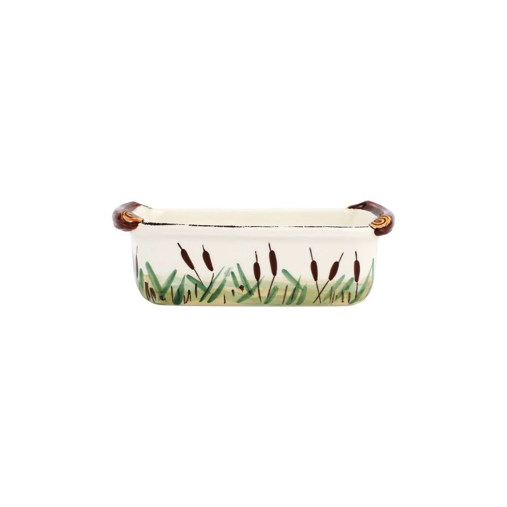 back side of goose loaf pan with cattails 