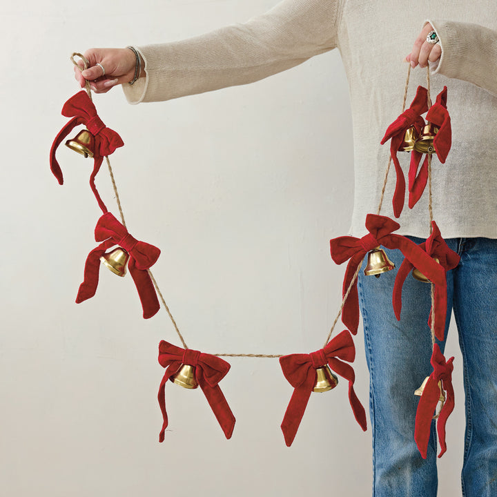 GOLD BELL GARLAND WITH RED VELVET BOWS