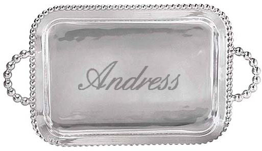 Silver tray with 'Andress' engraving on a white background