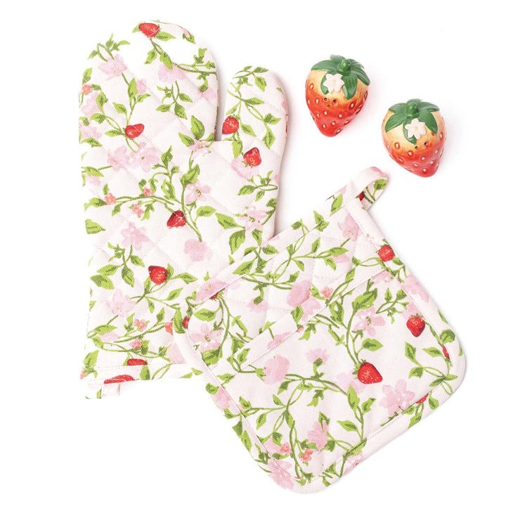 Floral oven mitt and pot holder with strawberry pattern on a white background