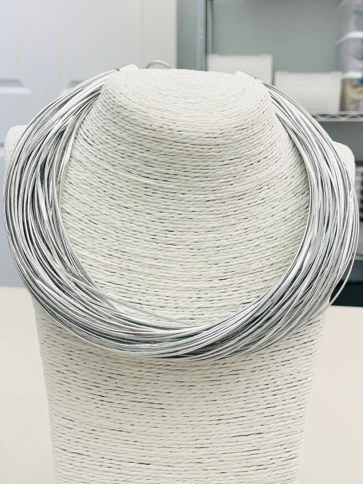SILVER LEATHERETTE STRAND NECKLACE