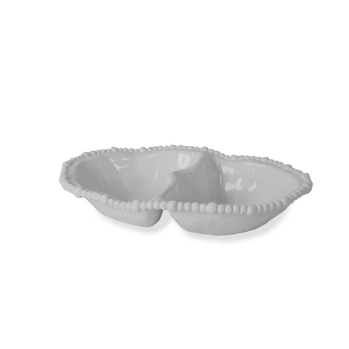 White ceramic bowl with decorative rim on a white background