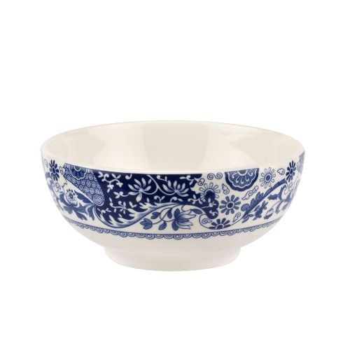 White bowl with blue floral pattern on a white background