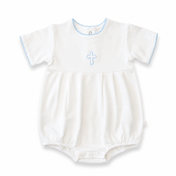 White baby romper with blue cross design on a white background