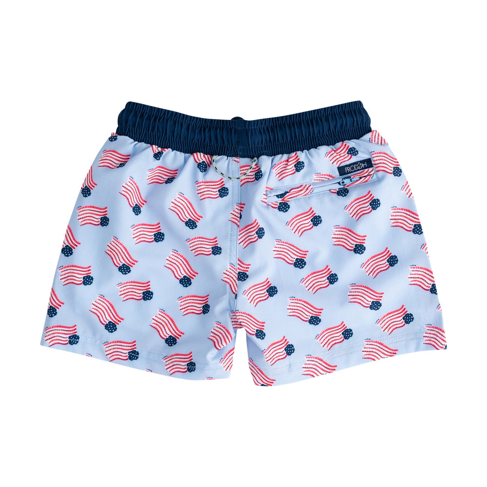Children's swim shorts with American flag pattern on a white background