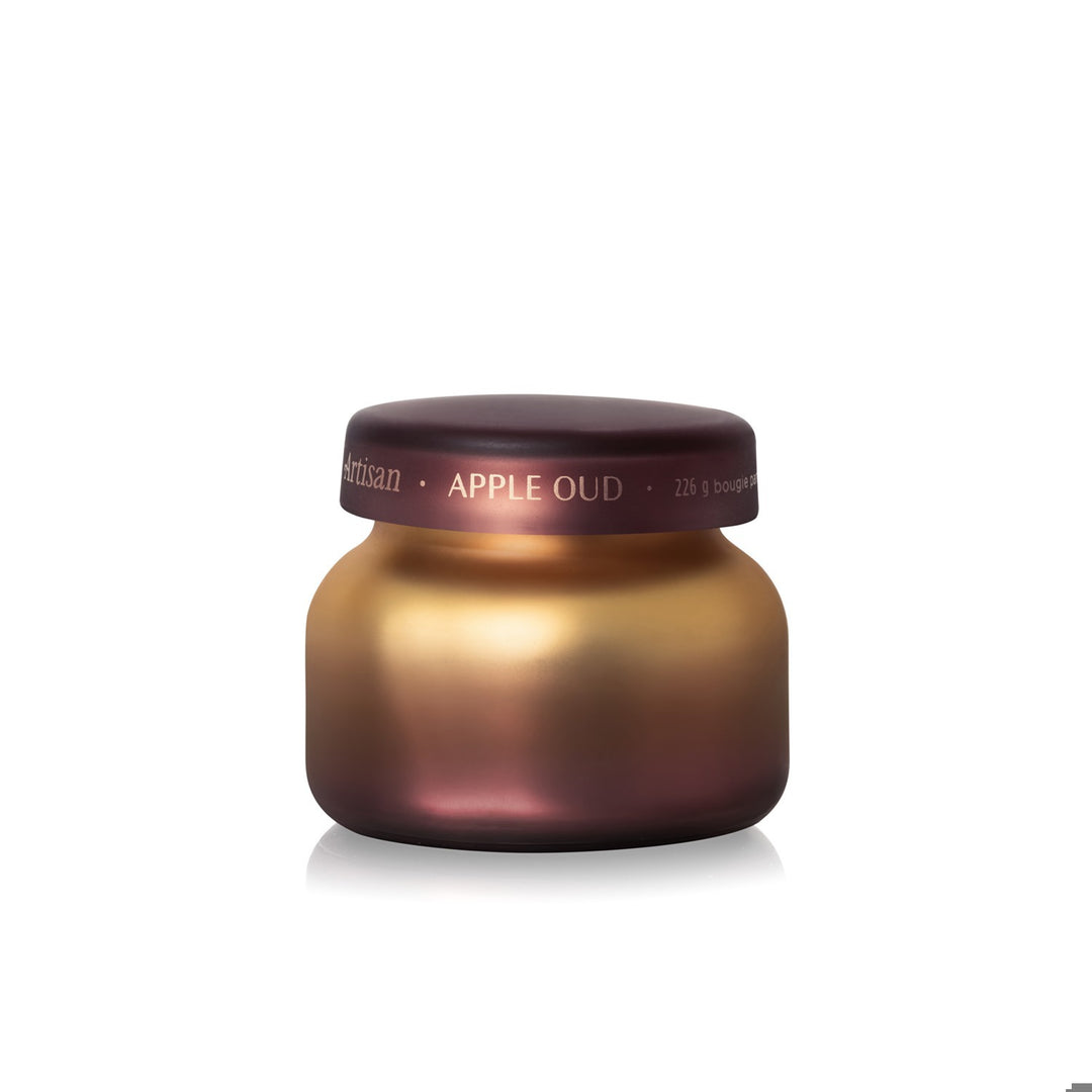 Apple Oud Tuscan Radiance petite candle in a gold and burgundy ombre glass jar
