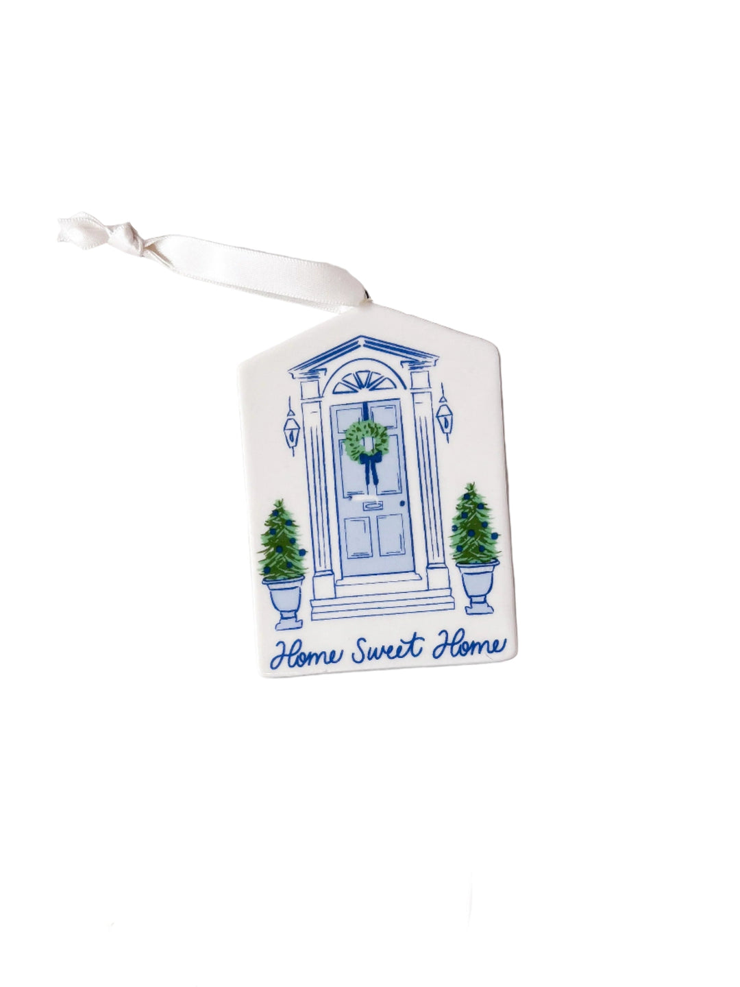Christmas-themed ceramic ornament on a white background